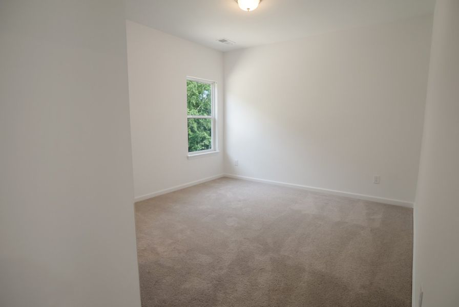Spacious, unfurnished interior of a new home in Marlin Pointe, White House (Image 16).