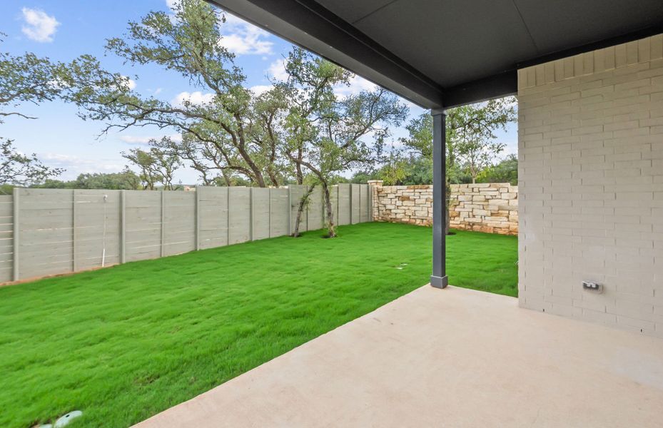 Exterior details and patio area of a home in Wolf Ranch, Georgetown (Image 23).
