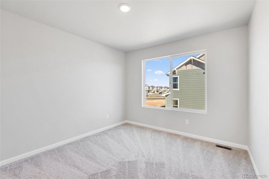 Spacious, unfurnished interior of a new home in Cherry Meadows, Brighton (Image 23).