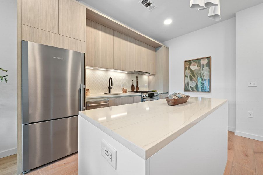 Furnished interior view inside a new home in One Oak, Austin (Image 4).