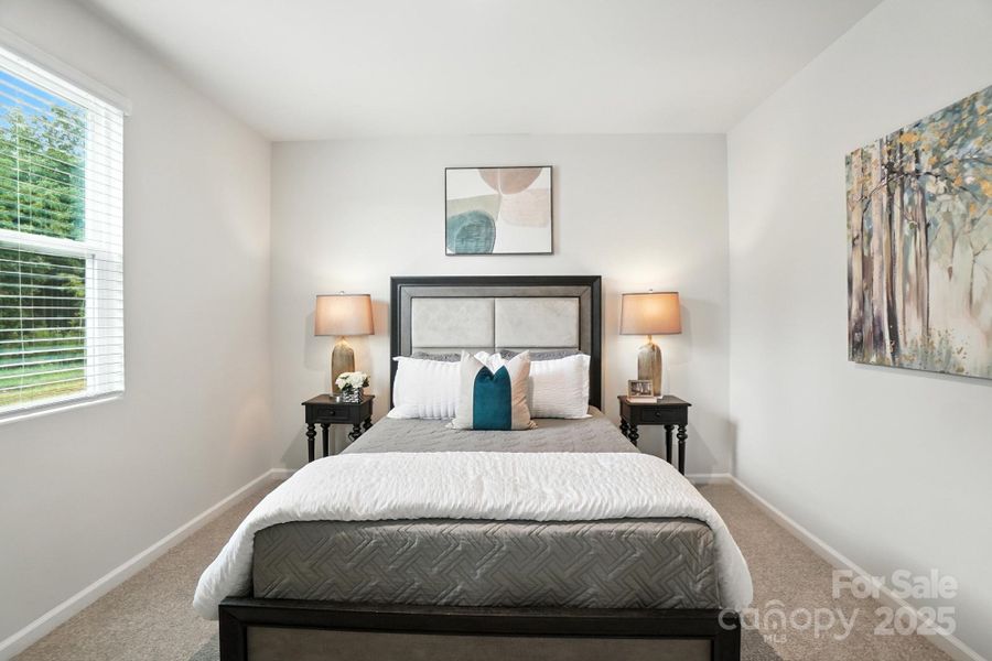 Furnished interior view inside a new home in Waxhaw Landing, Monroe (Image 10).