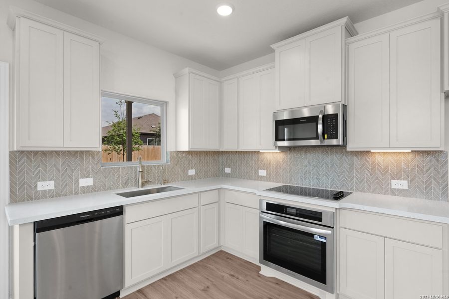 Furnished interior view inside a new home in Casinas at Gruene, New Braunfels (Image 6).
