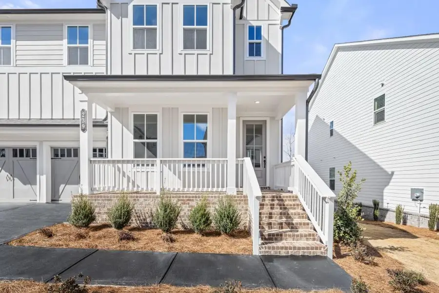 Exterior details and patio area of a home in East Harbor II at Chestatee, Dawsonville (Image 3).