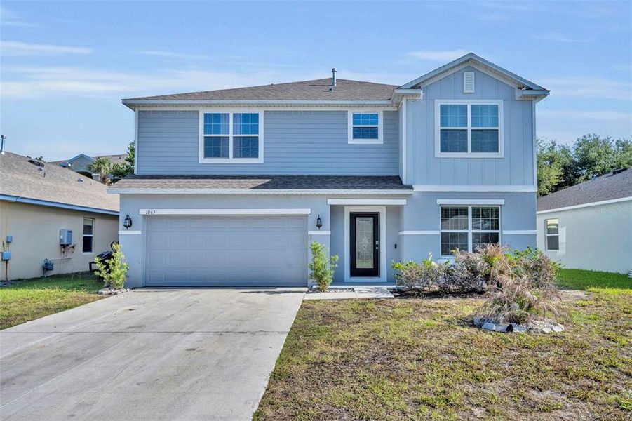 Front exterior of a new home in , Leesburg, FL, highlighting curb appeal (Image 21).