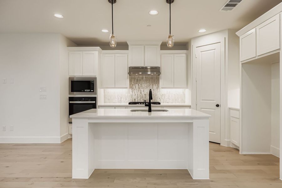 Furnished interior view inside a new home in Castle Hills Northpointe - Townhomes, Carrollton (Image 8). Furnished interior view inside a new home in Castle Hills Northpointe - Townhomes, Carrollton (Image 8).