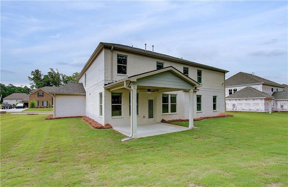 Exterior details and patio area of a home in Cambria at Traditions, Hampton (Image 3).