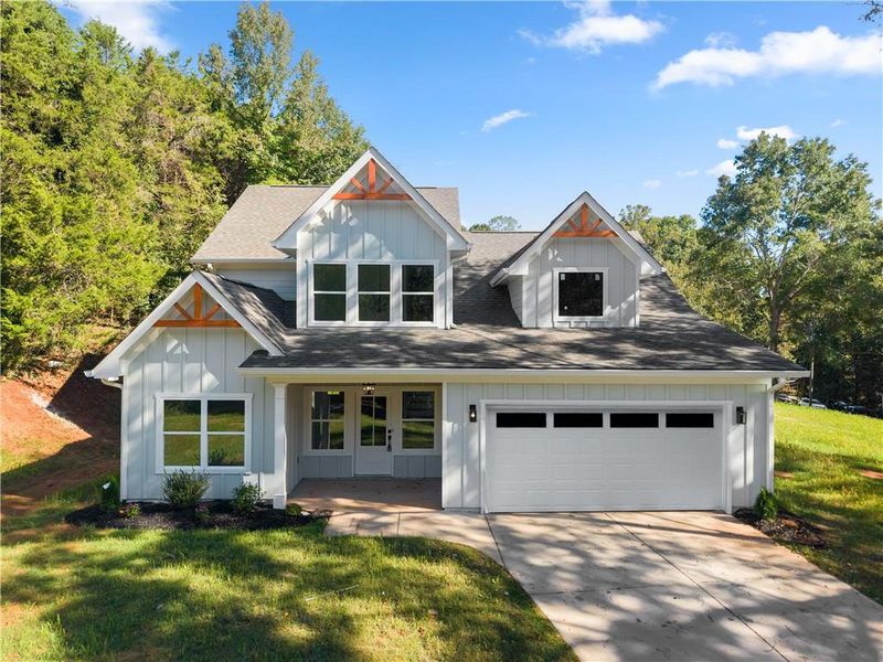 Front exterior of a new home in , Gainesville, GA, highlighting curb appeal (Image 18).