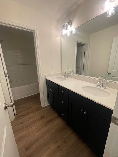 Furnished interior view inside a new home in Springwood Grove, Central (Image 7).