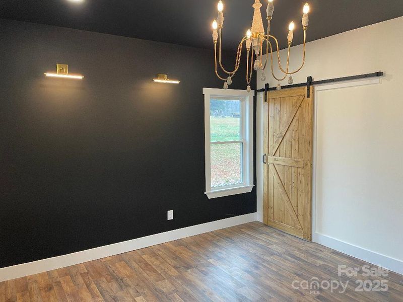 Primary Bedroom - feature wall with accent lighting for relaxing in bed