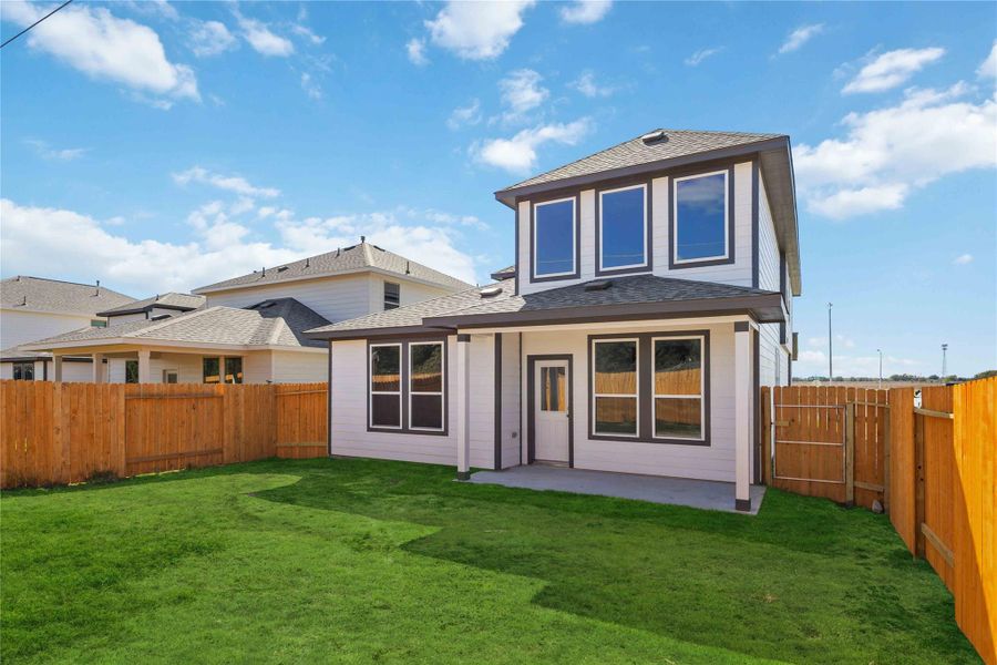 Exterior details and patio area of a home in Tejas Village, Beasley (Image 4).