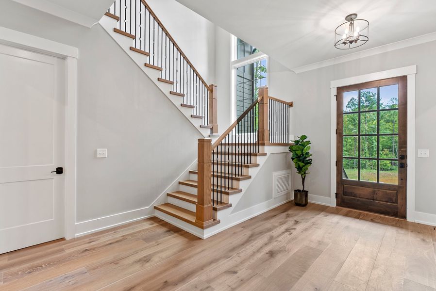 Representative unfurnished interior of a home built from the Nash by Homes by Dickerson in Corbett Landing, Pittsboro (Image 12). Representative unfurnished interior of a home built from the Nash by Homes by Dickerson in Corbett Landing, Pittsboro (Image 12).