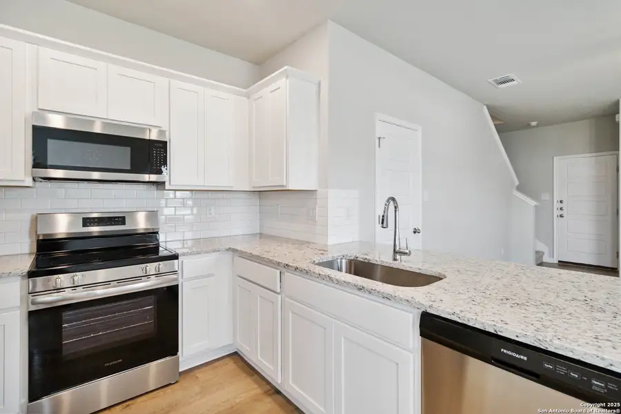 Furnished interior view inside a new home in , Converse (Image 5).