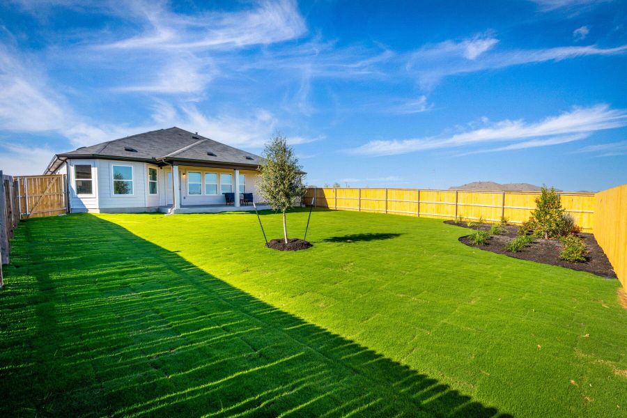 This is the back exterior of the Hawkins plan and is the model home in Carillon at 13305 Eppright Trace Blvd., Manor, TX. This is the back exterior of the Hawkins plan and is the model home in Carillon at 13305 Eppright Trace Blvd., Manor, TX.