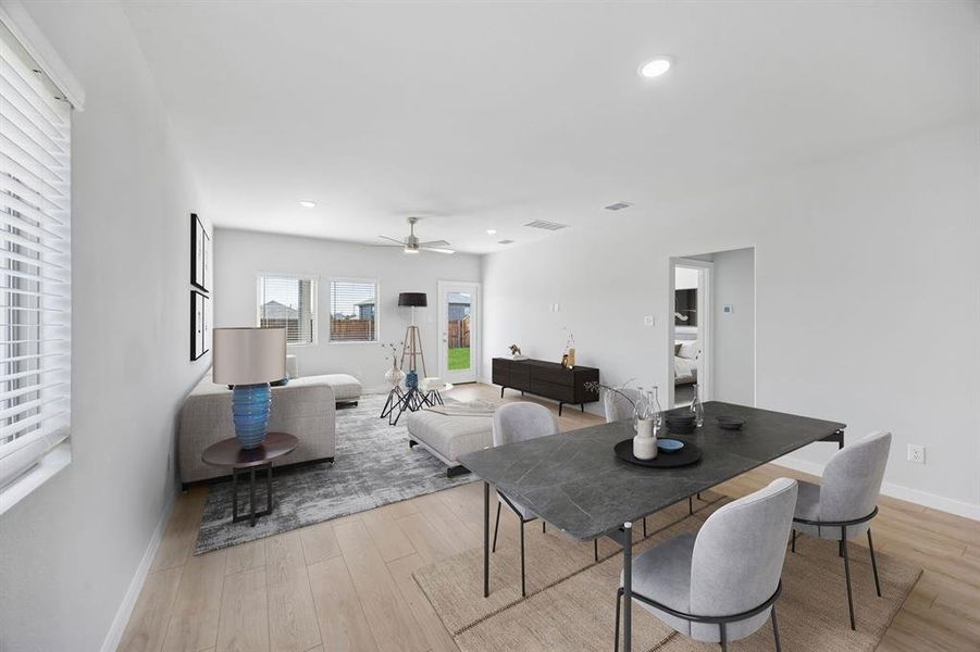 Living and Dining Rooms in the Mesquite home plan by Trophy Signature Homes – REPRESENTATIVE PHOT