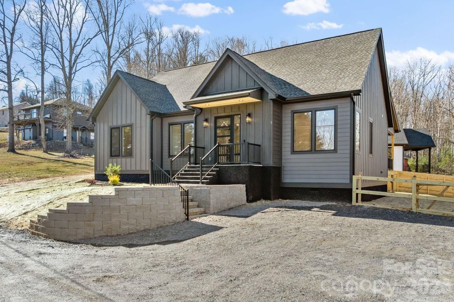 Exterior details and patio area of a home in , Fletcher (Image 24).