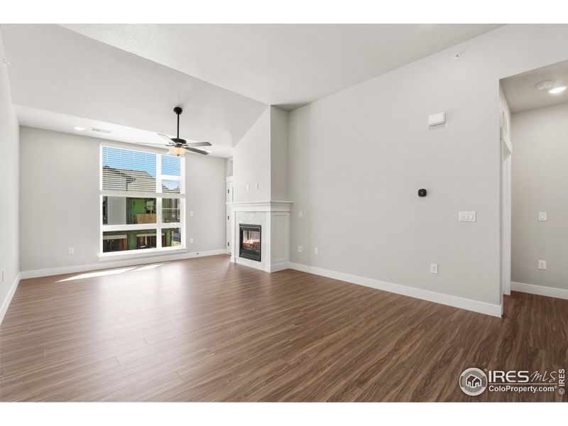 Extended luxury vinyl throughout the entire living room and kitchen!