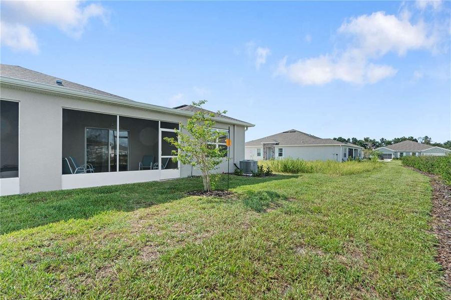 Front exterior of a new home in Park Ridge Villas, Spring Hill, FL, highlighting curb appeal (Image 25).