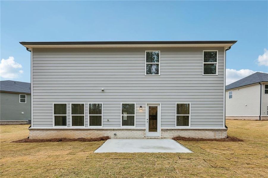 Exterior details and patio area of a home in Parkside at Grayson, Grayson (Image 3).