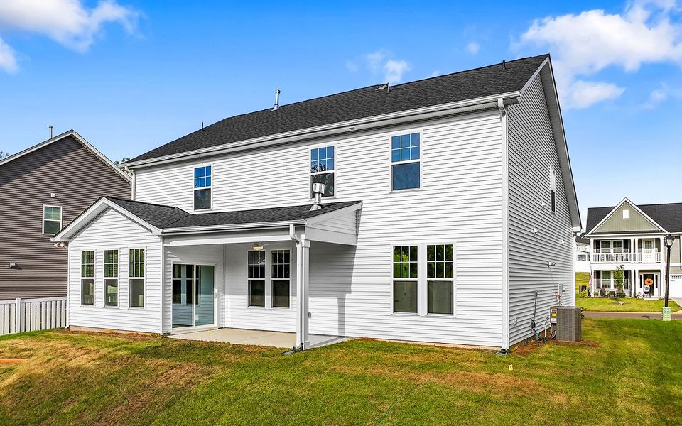 Exterior details and patio area of a home in Hanes Lake, Winston-Salem (Image 3).