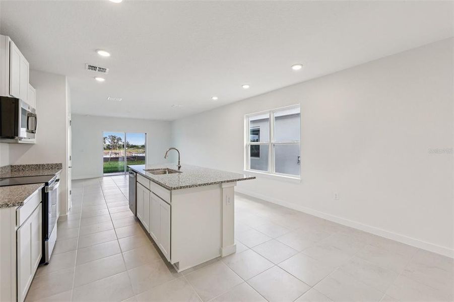 Furnished interior view inside a new home in Willowbrook North, Winter Haven (Image 8).