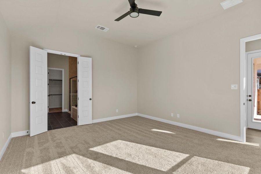 Primary Bedroom with elevated ceiling