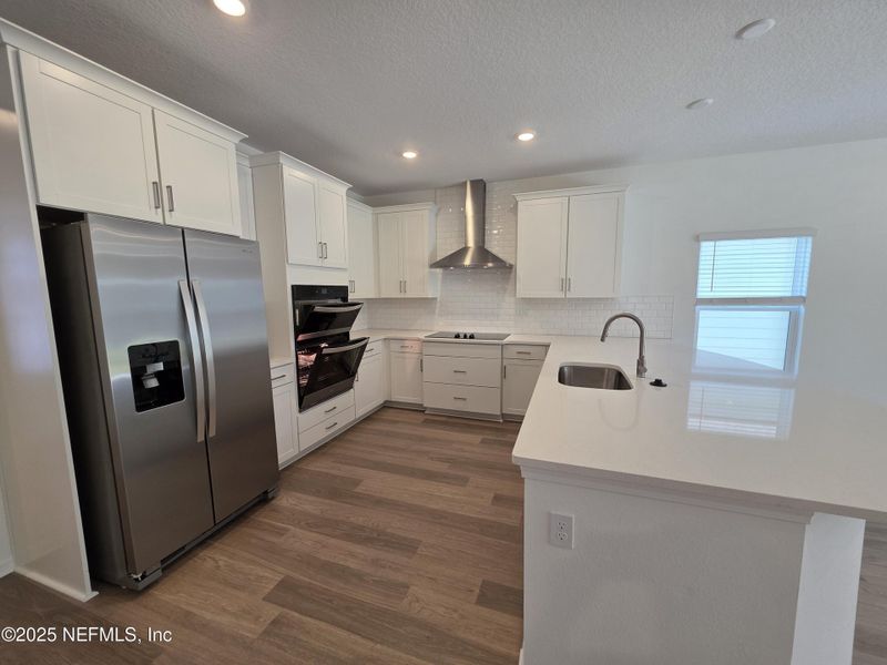 Furnished interior view inside a new home in Hyland Trail, Green Cove Springs (Image 14).