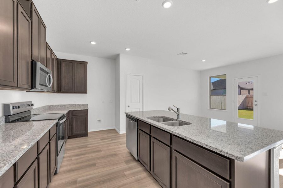 Furnished interior view inside a new home in Mustang Valley, Manor (Image 8). Furnished interior view inside a new home in Mustang Valley, Manor (Image 8).