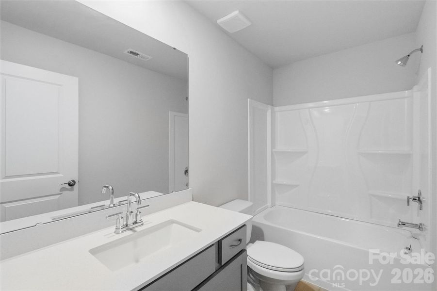 Furnished interior view inside a new home in Village of Waxhaw, Waxhaw (Image 7).