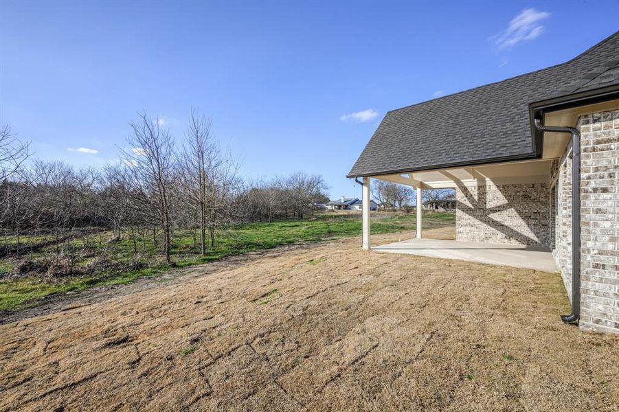 Exterior details and patio area of a home in , Farmersville (Image 4).