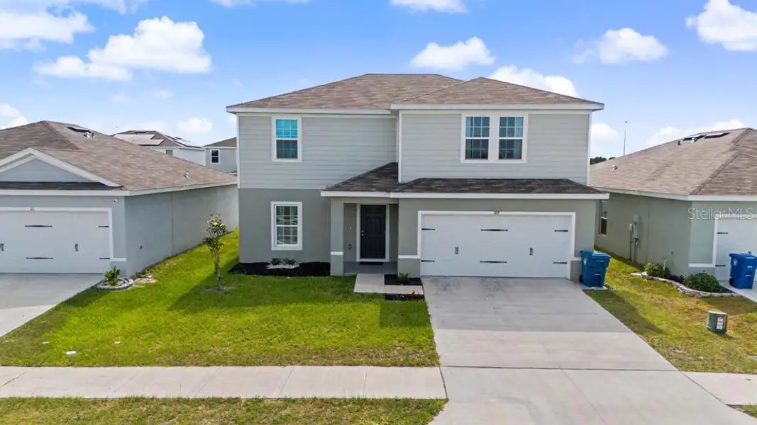 Front exterior of a new home in , Brooksville, FL, highlighting curb appeal (Image 1). Front exterior of a new home in , Brooksville, FL, highlighting curb appeal (Image 1).