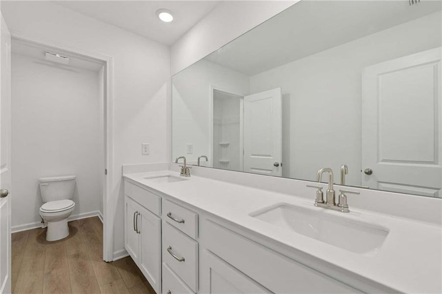Furnished interior view inside a new home in Eastlyn Crossing - Single Family, Flowery Branch (Image 10). Furnished interior view inside a new home in Eastlyn Crossing - Single Family, Flowery Branch (Image 10).