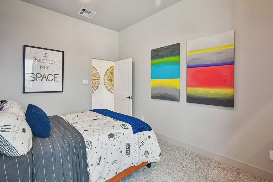Furnished interior view inside a new home in Meridiana Chateau, Manvel (Image 8).