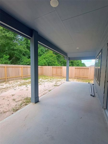 Exterior details and patio area of a home in Splendora Fields, Splendora (Image 4).