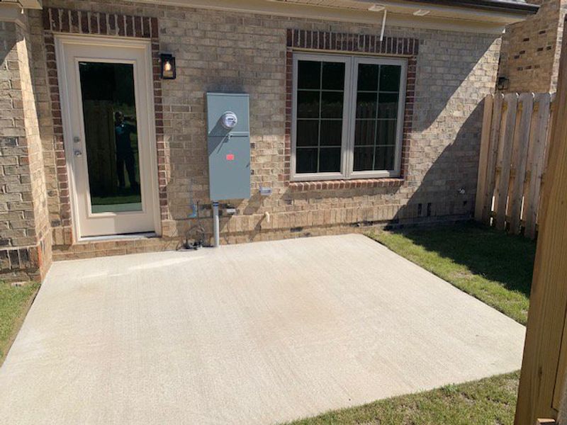 Exterior details and patio area of a home in Trellises, High Point (Image 18). Exterior details and patio area of a home in Trellises, High Point (Image 18).