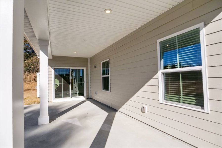 Exterior details and patio area of a home in Canterbrook Farms Ranches, Fountain Inn (Image 3). Exterior details and patio area of a home in Canterbrook Farms Ranches, Fountain Inn (Image 3).