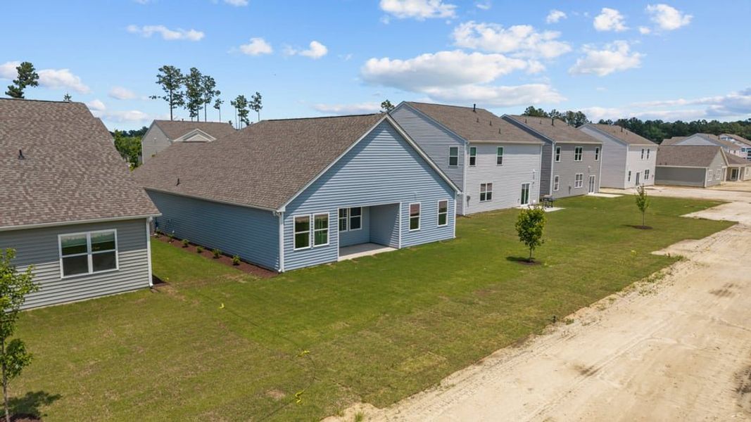 Exterior details and patio area of a home in West New Bern, New Bern (Image 24).