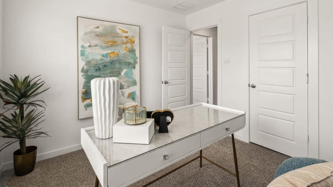 Furnished interior view inside a new home in Grand West, Houston (Image 10).