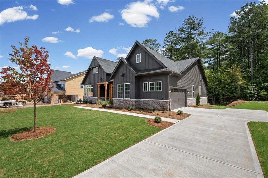 Front exterior of a new home in Governor’s Preserve, Canton, GA, highlighting curb appeal (Image 20).