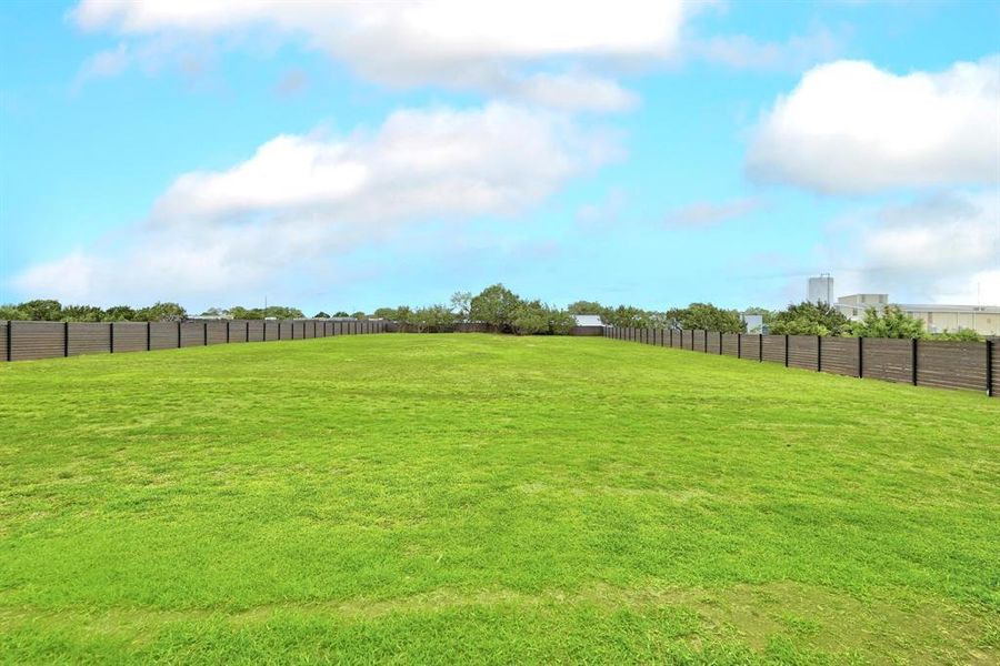 View of yard with a view of countryside