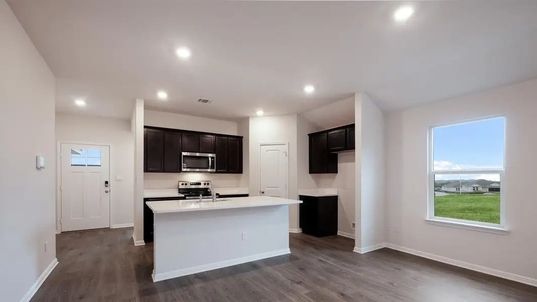 Furnished interior view inside a new home in Thunder Rock, Marble Falls (Image 6).