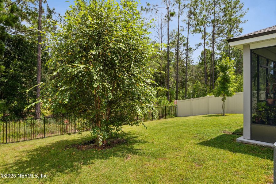 Front exterior of a new home in Dorado at Entrada, St. Augustine, FL, highlighting curb appeal (Image 25).
