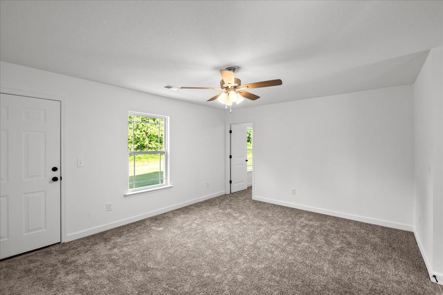 Representative unfurnished interior of a home built from the Riley by Enchanted Homes in Las Palomas Country Club Estates, La Vernia (Image 10). Representative unfurnished interior of a home built from the Riley by Enchanted Homes in Las Palomas Country Club Estates, La Vernia (Image 10).