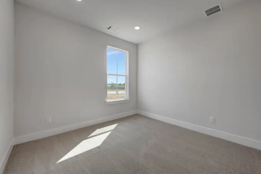 Spacious, unfurnished interior of a new home in The Meadows, Denton (Image 23).