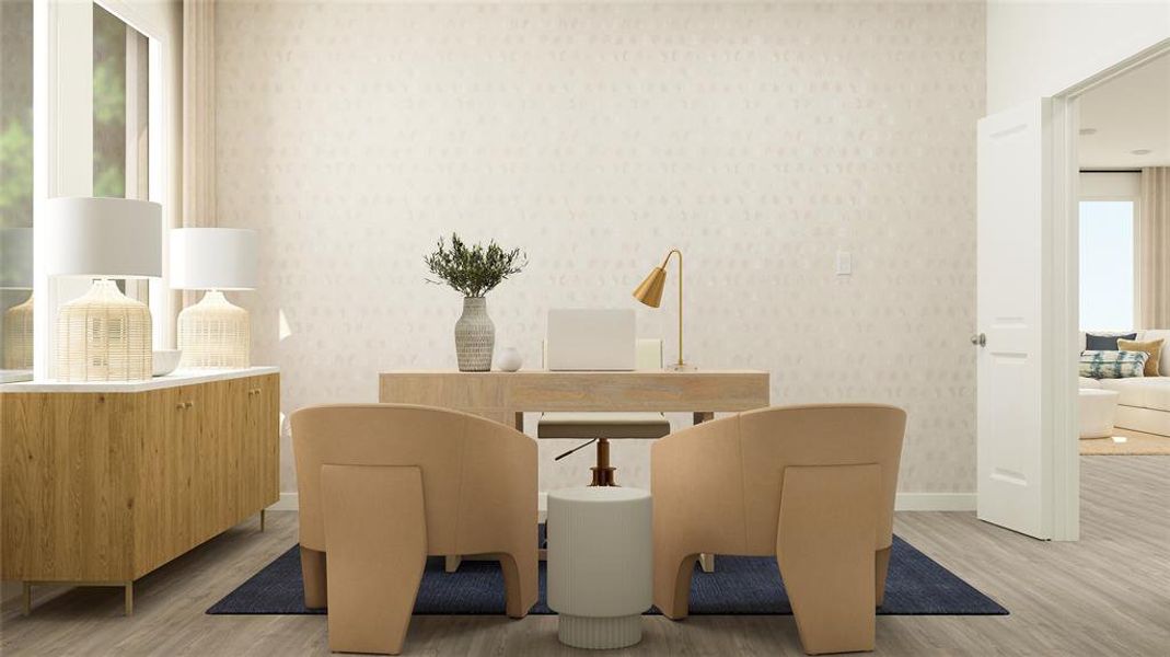 Dining space with light hardwood / wood-style floors