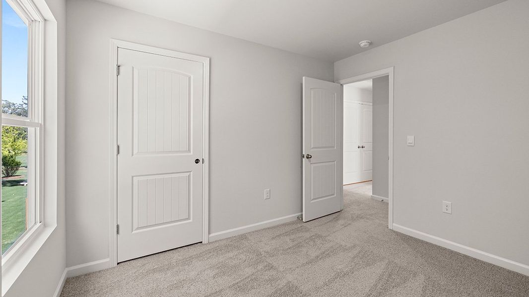 Spacious, unfurnished interior of a new home in Waypoint, Flowery Branch (Image 28).