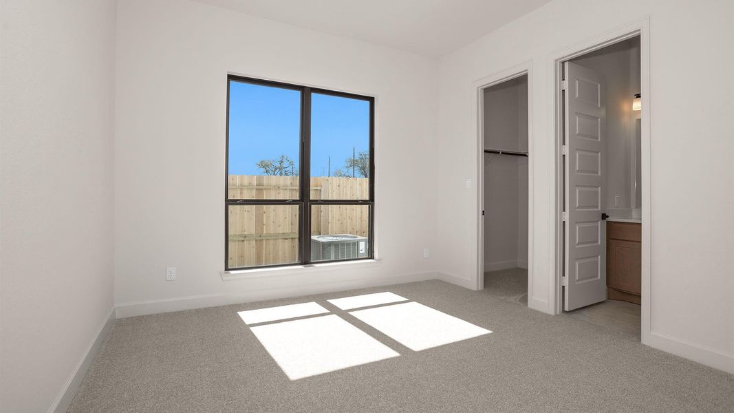 Spacious, unfurnished interior of a new home in Sienna, Missouri City (Image 7).