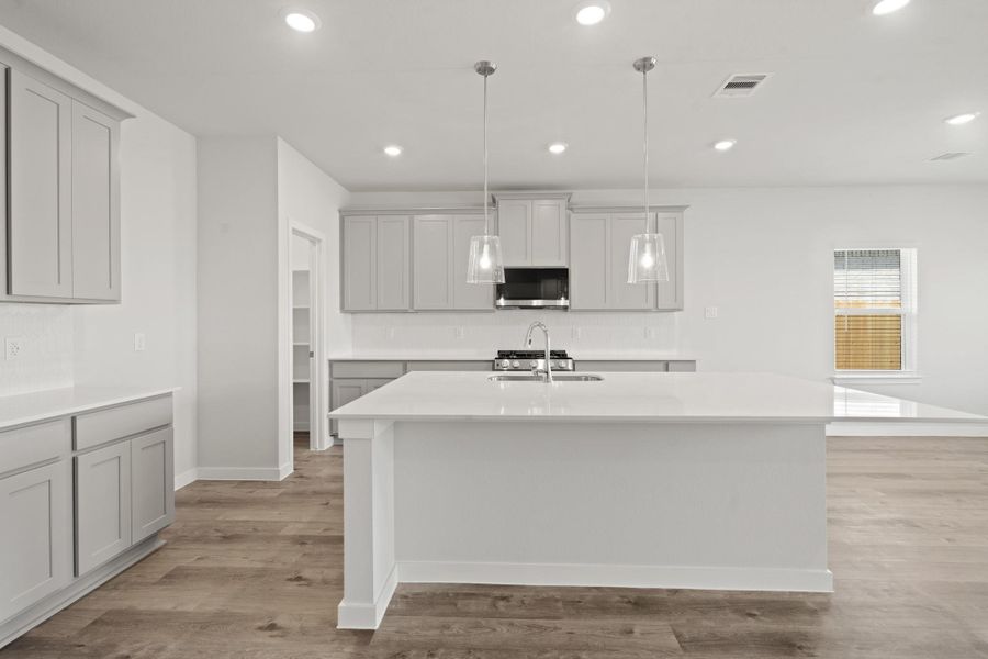 Furnished interior view inside a new home in Sunterra Lakes, Brookshire (Image 6).