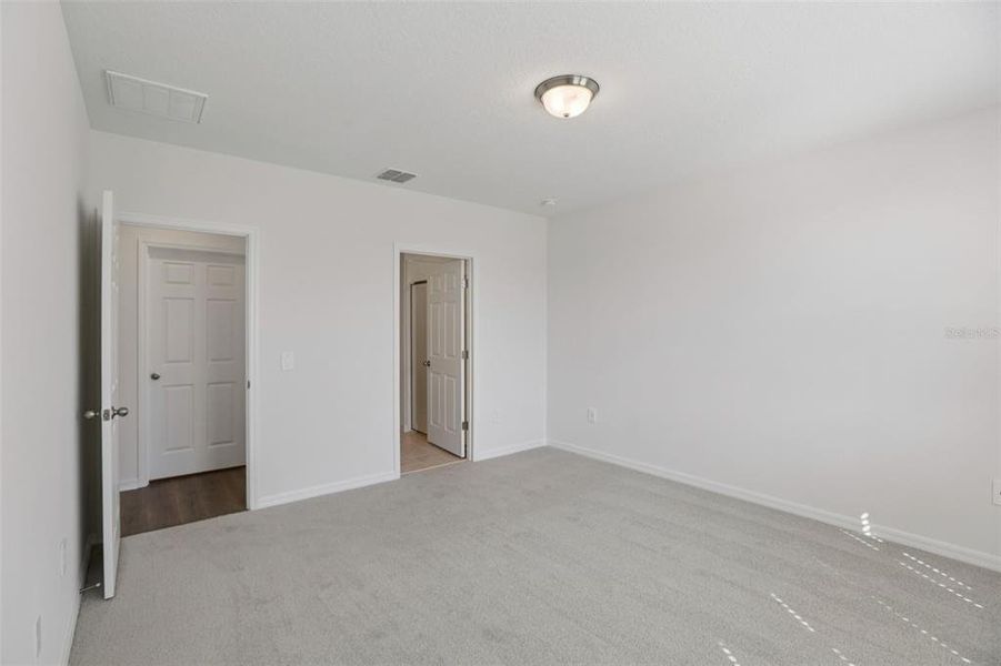 Spacious, unfurnished interior of a new home in Springs at Lake Alfred - Classic Series, Lake Alfred (Image 17).