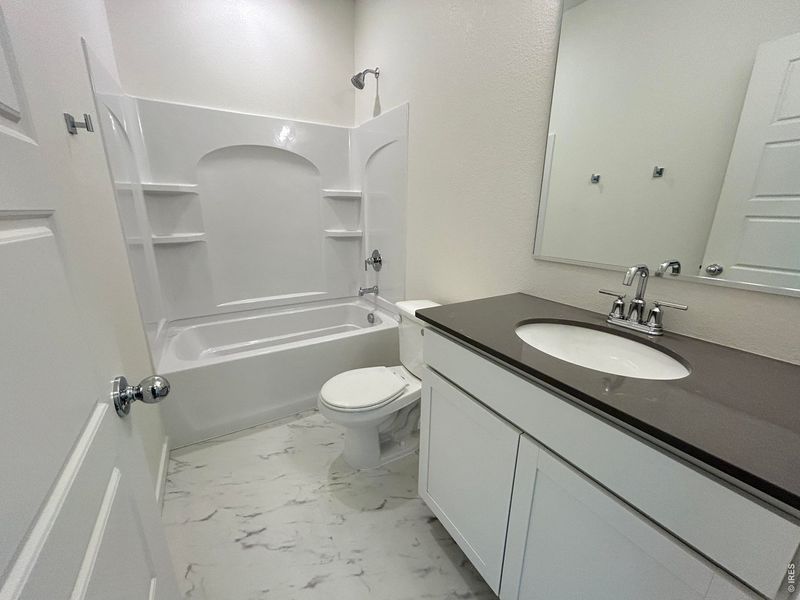Furnished interior view inside a new home in Union Colony West, Greeley (Image 6).