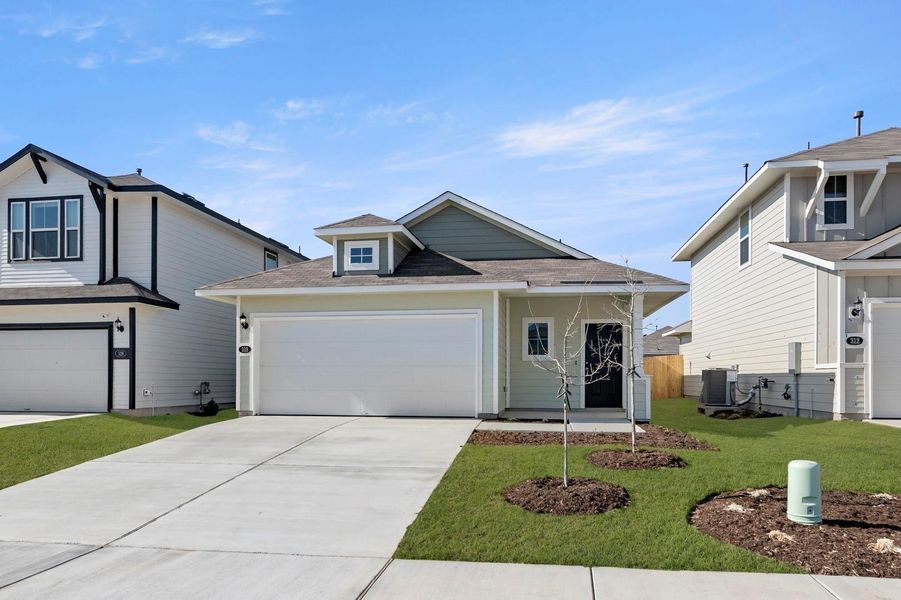 Front exterior of a new home in Hymeadow, Maxwell, TX, highlighting curb appeal (Image 21).